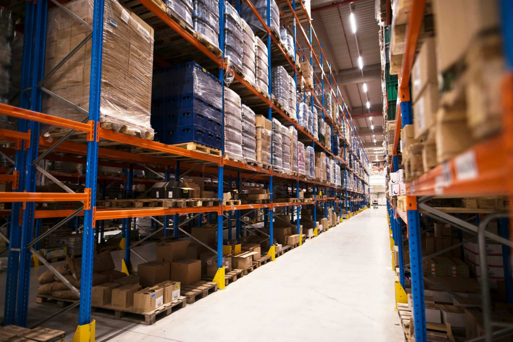 interior-large-distribution-warehouse-with-shelves-stacked-with-palettes-goods-ready-market.jpg